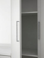 Two polished chrome beaded ball pulls on white wardrobe doors, vertical orientation