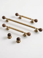 Antique brass walnut ball cabinet pulls all sizes flat lay with knob