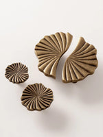 Antique brass ginkgo leaf knobs and split pull — all 3 sizes flat lay