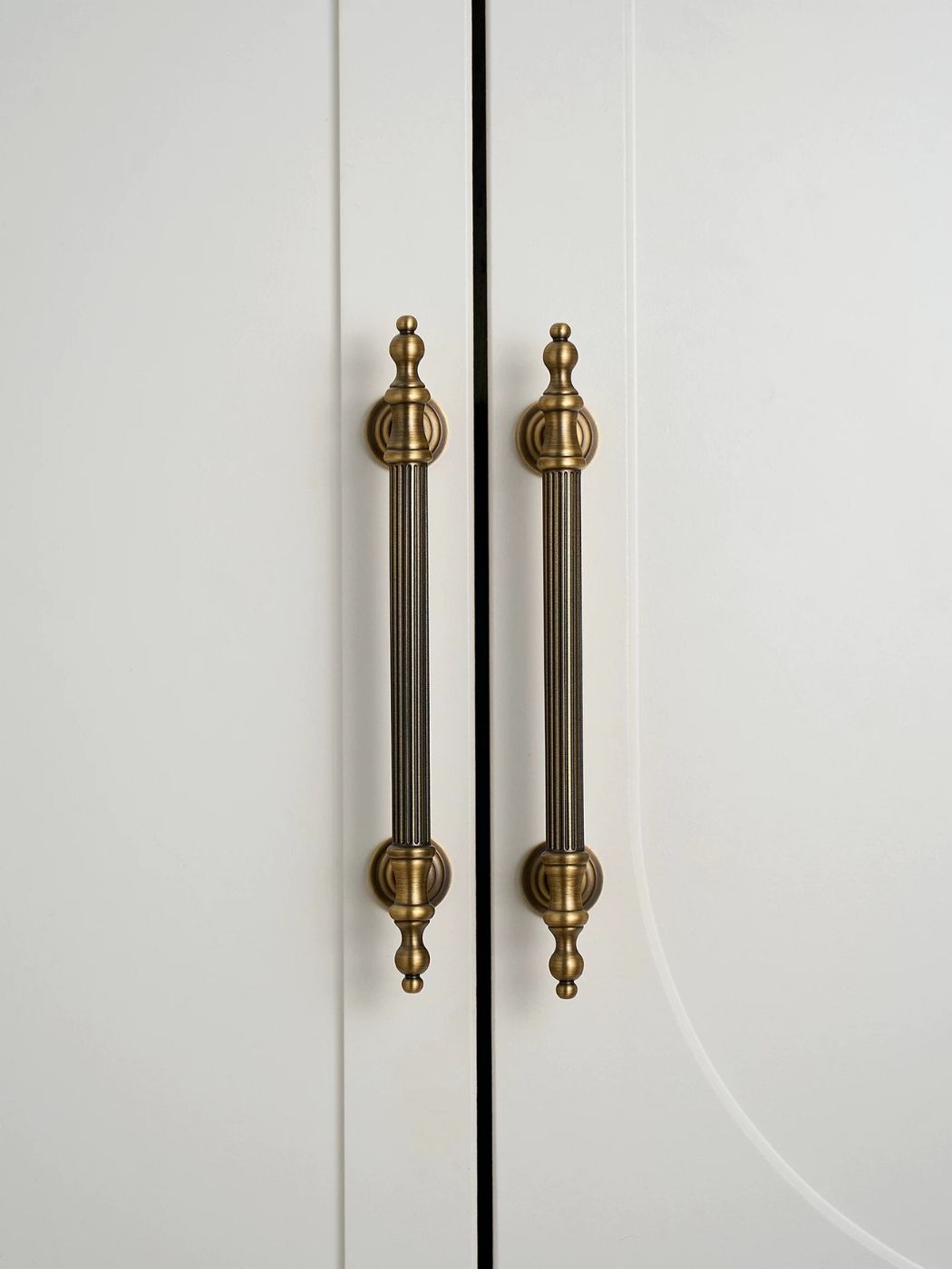 Antique Brass Fluted Bar Pull on White Wardrobe