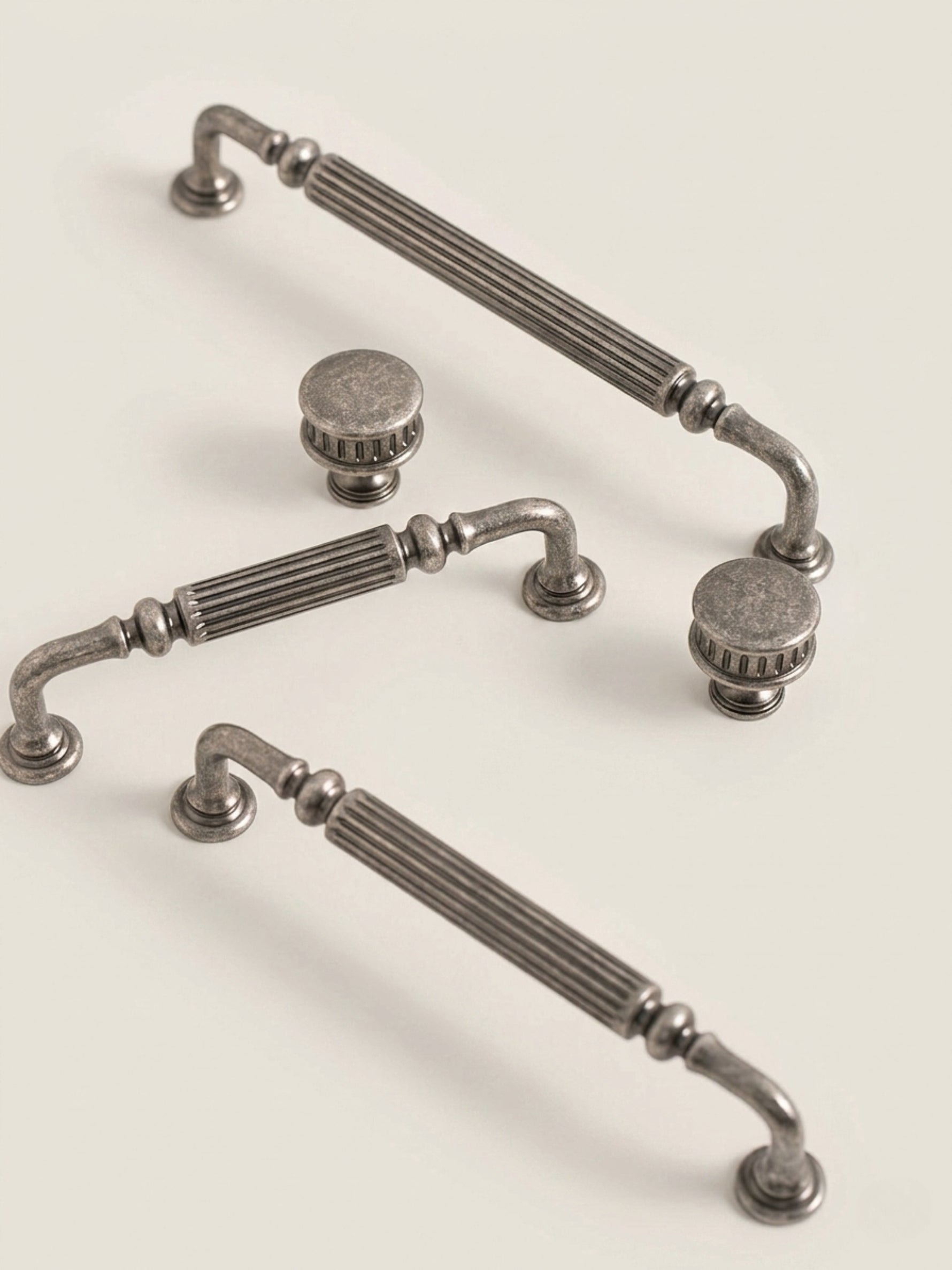 Antique silver reeded hardware set — large pull, medium pull, small pull and knob