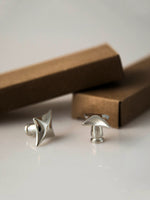 Two polished chrome star knobs with kraft paper packaging boxes