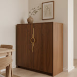 Satin gold circle ring cabinet pull on dark walnut wardrobe in styled Japandi living room