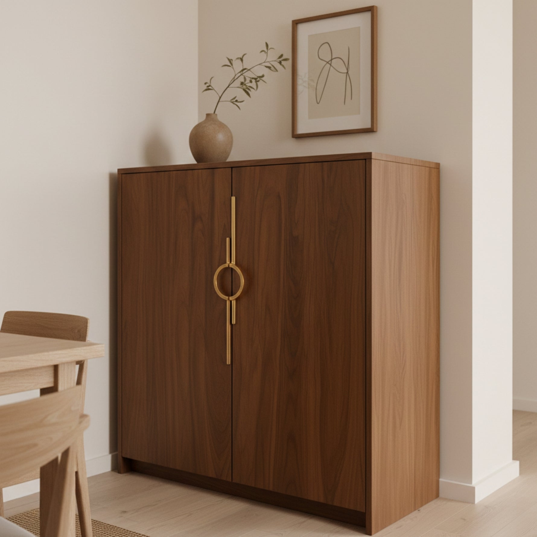 Satin gold circle ring cabinet pull on dark walnut wardrobe in styled Japandi living room
