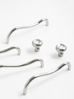 Chrome wave pulls with matching round knobs