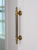Vintage Brass Fluted Pull on White Door Side View