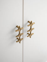Boho Antique Brass Star Cabinet Pull Angled View OlumeHardware