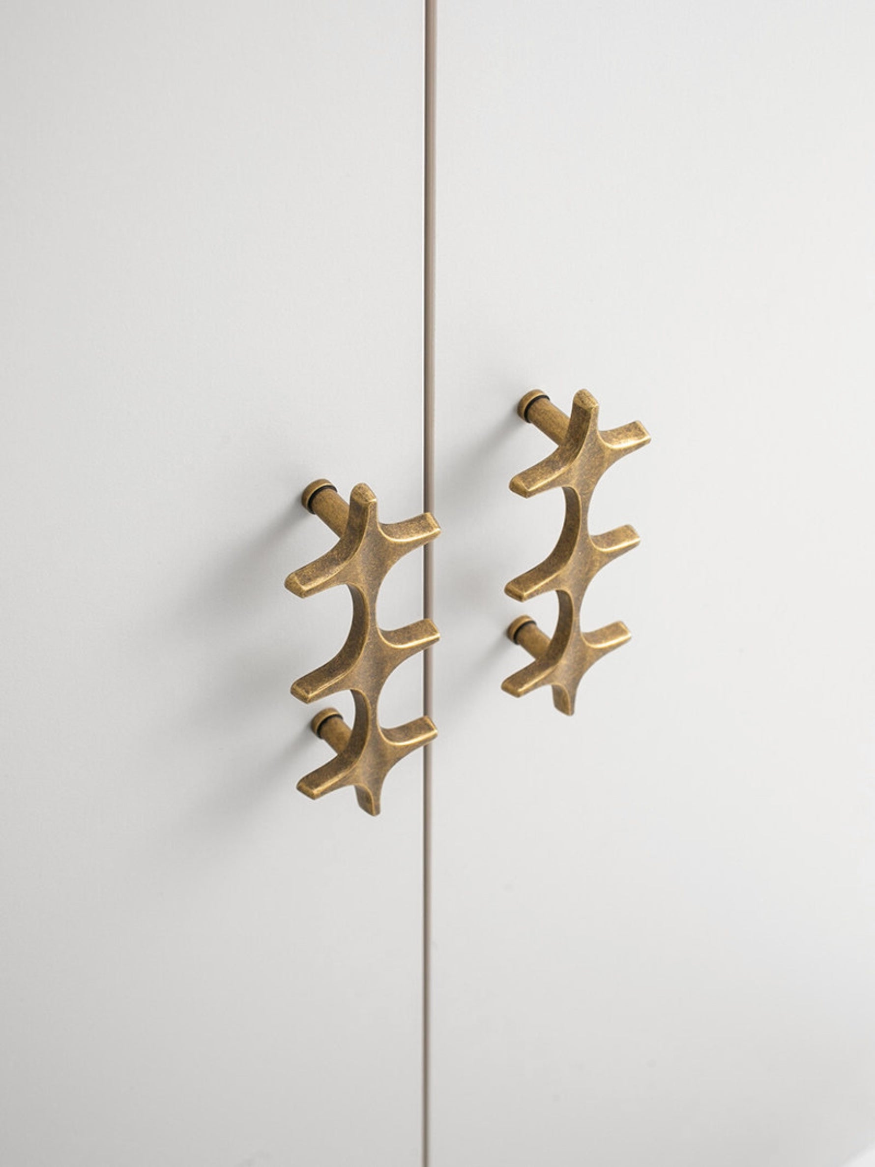 Boho Antique Brass Star Cabinet Pull Angled View OlumeHardware