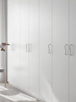 Installing chrome wave pulls on wardrobe with drill